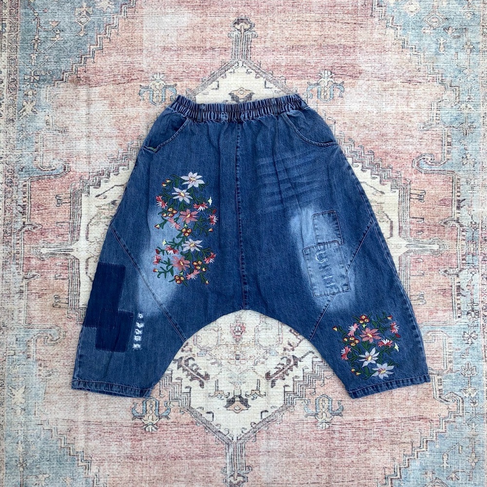 Embellished and distressed, drop crotch, cropped pants